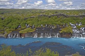 Hraunfossar Waterfalls with river Hvita