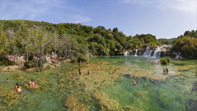 Tourists bathing at the Skradinski Buk waterfall