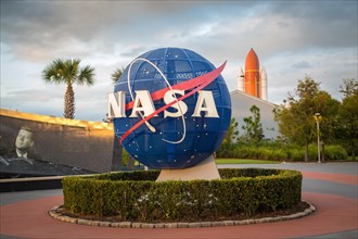 Nasa logo in front of Kennedy Space Center