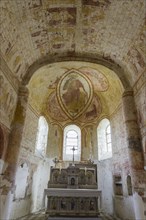 Frescoes above the altar from the 11th century in the church of Saint Genest