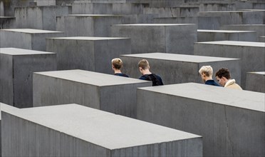 Youth walking through Holocaust Memorial
