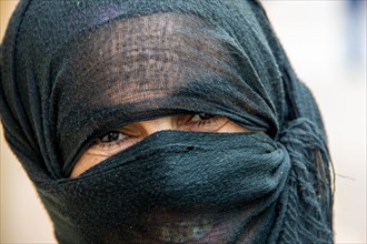 Portrait of a woman with burka