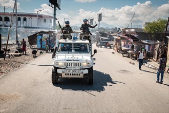 UN blue helmets in jeep on patrol