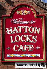 Advertising sign of the cafe in the former lockkeeper's cottage on the Grand Union Canal