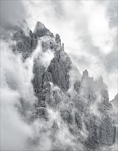 Cloud-covered rocky peaks