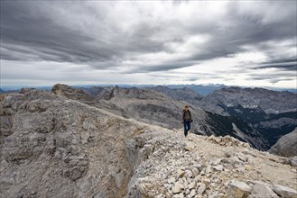 Mountaineer on the summit of the western Oedkarspitze