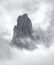Cloud-covered rocky peaks