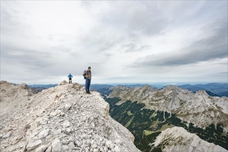Hiker at the summit of the eastern Oedkarspitze