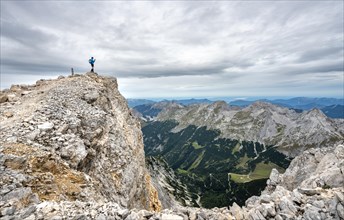 Hiker at the summit of the eastern Oedkarspitze