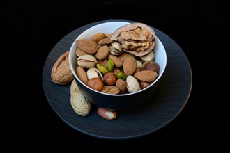 Various nuts on plates