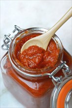 Red Thai curry paste in glass