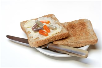 Food supplement on toast with knife