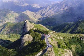 Mountain Roque de la Zarcita with mountain road in Monumento Natural de los Roques