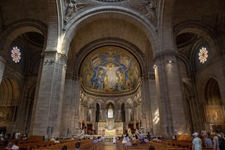 Interior view with main altar and mosaic in the apse