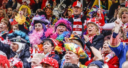 Colourfully costumed carnivalists celebrate carnival in Cologne