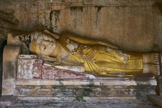 Lying Buddha figure