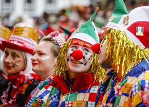 Colourfully costumed carnivalists celebrate carnival in Cologne