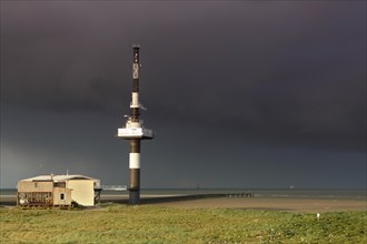 Radar tower on the Minsener Oog power plant in a bad weather front
