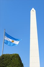 Obelisk and Argentinian flag on Avenue 9 de Julio