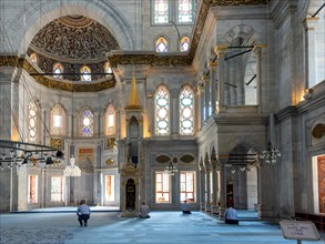 Believers pray at the Nuruosmaniye Mosque