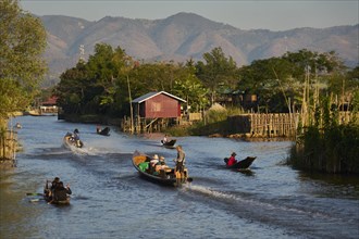 Boats in the main channel of the Intha pile village Inn Paw Khon