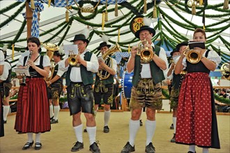 Musicians of a Bavarian brass band in traditional traditional traditional traditional traditional traditional traditional traditional traditional traditional costume