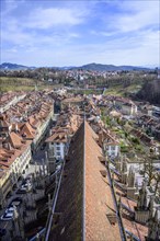 View from Bern Cathedral to the red tiled roofs of the houses in the historic centre of the old town