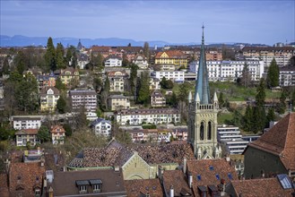 View from Bern Cathedral to the christian catholic church St. Peter and Paul in the historical centre of the old town