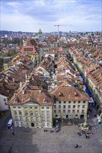 View from the Bernese Minster to the Muensterplatz and the red tiled roofs of the houses in the historic centre of the old town