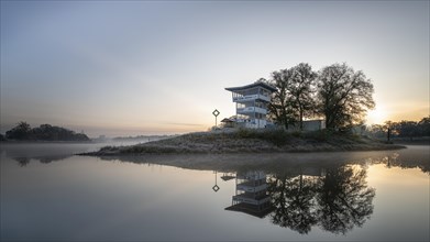 Morning atmosphere on the Elbe with clubhouse of the MBC Elbe-Dessau
