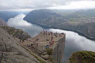 Many tourists at Preikestolen on the Lysefjord