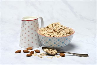 Rolled oats in shell, milk and nuts