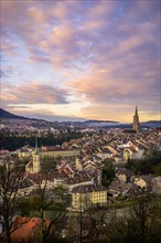 City view at sunrise, view from the rose garden to the old town