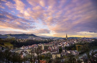 City view at sunrise, view from the rose garden to the old town