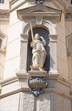 Figure of Justitia with sword, scales and blindfold