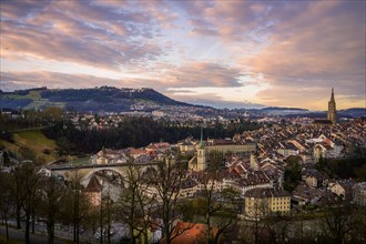 City view at sunrise, view from the rose garden to the old town