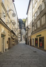 Vacant places due to the coronavirus pandemic, Getreidegasse with Buergerspitalskirche