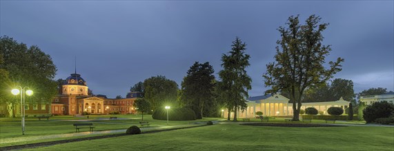 Spa garden at dusk, illuminated
