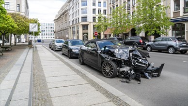 Traffic accident, heavily damaged car at Gendarmenmarkt