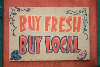 Advertising sign for local shopping, Buy fresh and local