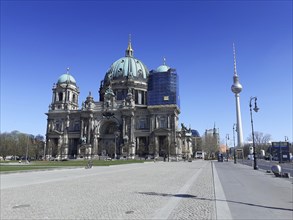Berliner Dom with the Fernsehturm in the background, during the lock-down due to the Coronavirus pandemic