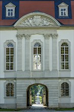 Gate and castle entrance under the ballroom, baroque castle Fasanerie