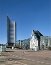 Empty Augustusplatz with City skyscraper and university, curfew due to coronavirus