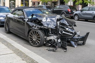 Traffic accident, heavily damaged car at Gendarmenmarkt