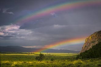 Double rainbow on the steppe after raining