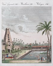 South Indian temple with temple pond and bathing Hindus