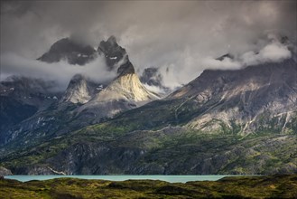 View over Lake Nordenskjoeld to the mountain range Cuernos del Paine in clouds