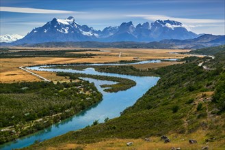 View of the mountain range Cuernos del Paine over the river Rio Serrano