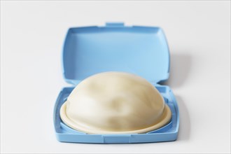 Diaphragm or vaginal pessary in storage box