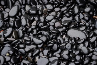 Black lava pebbles at Reynisfjara beach